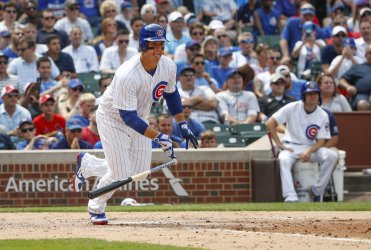 Cubs Anthony Rizzo hits an RBI single against the Cardinals in Chicago