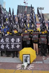 Hong Kongers hold a rally against Communist China's government in Tokyo
