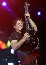 Journey performs in concert in West Palm Beach, Florida