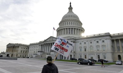 Lone demonstrator protests government shutdown and partisanship outside US Capitol