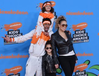Mariah Carey and Nick Cannon attend the Kids' Choice Awards with their chidren in Inglewood, California