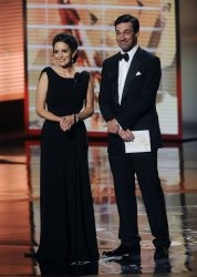 Tina Fey and Jon Hamm present an award at the 61st Primetime Emmy Awards in Los Angeles