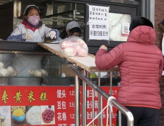 Dumpling store uses a 'bridge' to help customers in Beijing, China