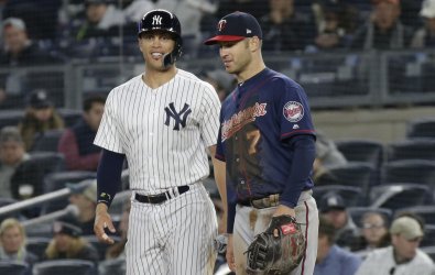 New York Yankees Giancarlo Stanton stands on first base