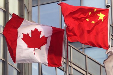Canadian and Chinese Flags Fly in Beijing, China