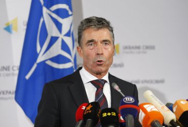 NATO Secretary General Anders Fogh Rasmussen speaks during a news conference