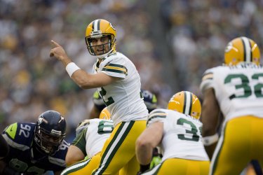 Green Bay Packers quarterback Aaron Rodgers changes a play against Seattle Seahawks at CenturyLink Field in Seattle.