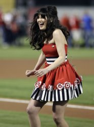Actress Zooey Deschanel performs the National Anthem prior to game 4 of the World Series in Texas