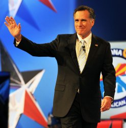 Romney waves to crowd before debate in Arizona