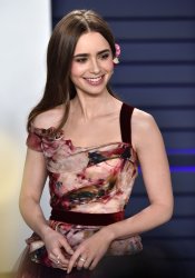 Lily Collins attends Vanity Fair Oscar Party 2019