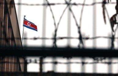 The North Korean flag flies over the North Korean embassy in Beijing