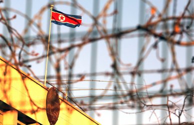 North Korean flag flies over its embassy in Beijing