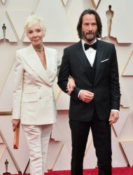 Patricia Taylor and Keanu Reeves arrive for the 92nd annual Academy Awards in Los Angeles