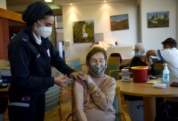 Residents Of The Migdal Nofim Assisted Living Facility Receive The Fourth COVID-19 Vaccine In Jerusalem