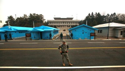 A U.S. marine stands watch near the demarcation line in the DMZ