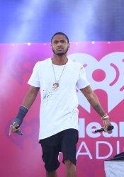 Trey Songz performs at the iHeartRadio Village Concerts