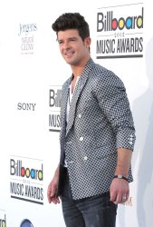 Musician Robin Thicke arrives at the 2012 Billboard Music Awards in Las Vegas, Nevada