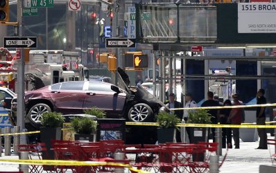 Car runs into a crowd of pedestrians in Times Square