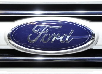 The logo for Ford on display at the Chicago Auto Show