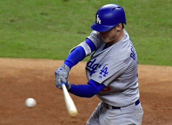 Dodgers Bellinger hits RBI triple in seventh in the World Series