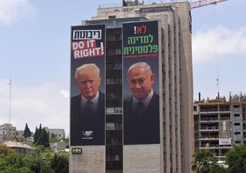 A BillBoard Against U.S. President Donald Trump's Peace Plan Stands in Jerusalem
