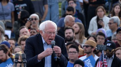 Alexandria Ocasio-Cortez joins Bernie Sanders at a rally in Venice Beach in Los Angeles