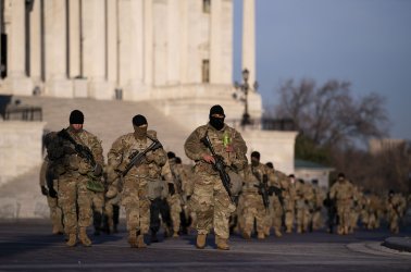 Members of the National Guard patrol the U.S. Capitol