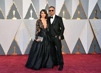 Charlotte Riley and Tom Hardy arrive for the 88th Academy Awards in Hollywood