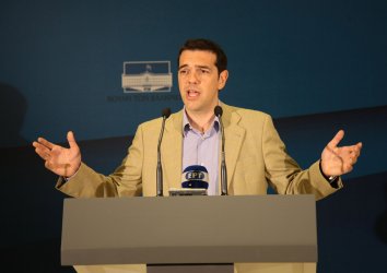Syriza Party leader Alexis Tsipras speaks in a press conference in the Greek Parliament