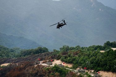 An AH-1S Attack Helicopter Flies During U.S.-South Korea Joint Drill