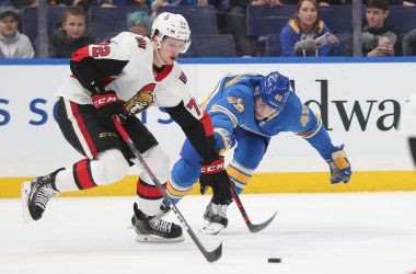 Ottawa Senators Thomas Chabot fends off St. Louis Blues Ivan Barbashev