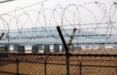 A barbed wire fence guards the Freedom Bridge connecting South Korea to the DMZ near Seoul