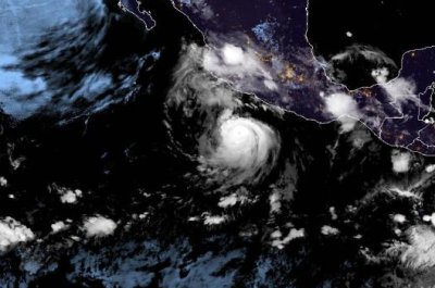 Hurricane Bonnie strengthens, remains south of Mexico