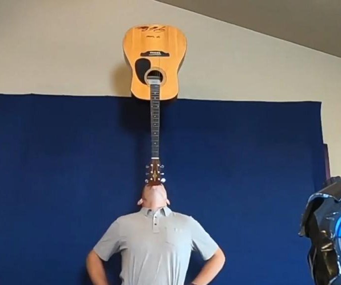 Watch: Idaho man balances guitar on his chin for 1 hour, 35 minutes -  UPI.com