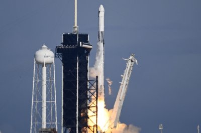 SpaceX resupply cargo capsule docks with International Space Station