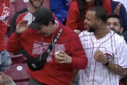 Reds fan accidentally catches baseball in beer cup, chugs for crowd