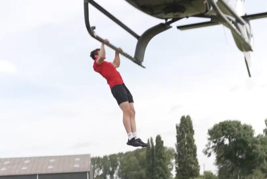 Watch: Fitness YouTubers do pull-ups from helicopter treads, break world record
