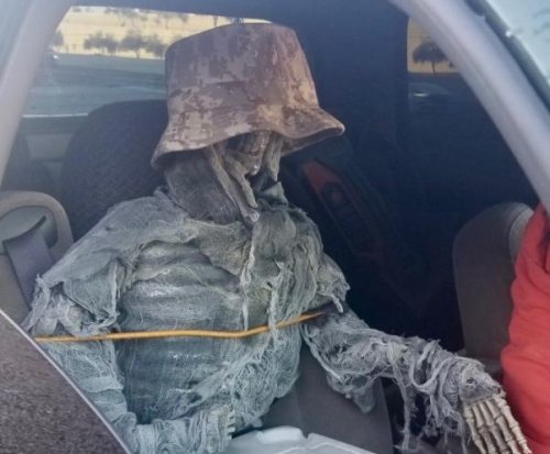 Driver caught using carpool lanes with skeleton passenger