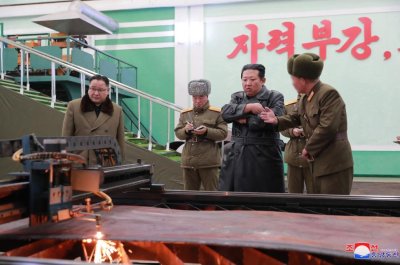North Korea confirms latest missile tests while Kim Jong Un visits weapons factory
