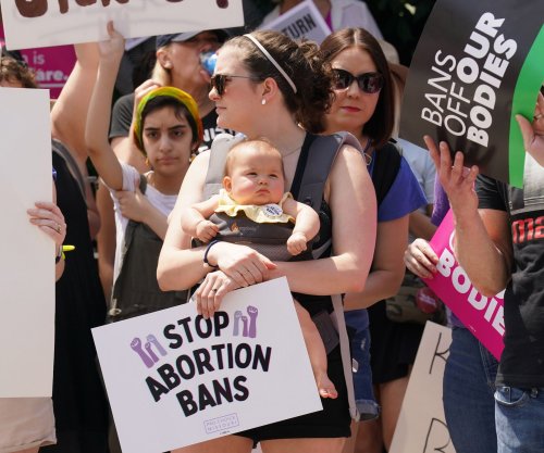 Oklahoma Gov. Kevin Stitt signs near total abortion ban into law