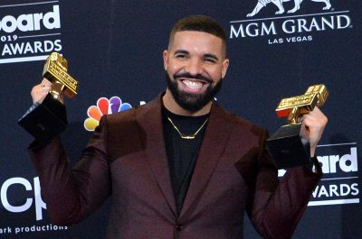 Listen:-Drake-reschedules-upcoming-show,-drops-new-song-with-DJ-Khaled