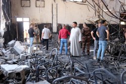 100 killed in fire at Iraqi wedding hall