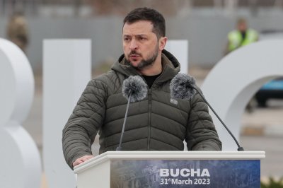 Volodymyr Zelensky visits Bucha, Ukraine on anniversary of Russian massacre