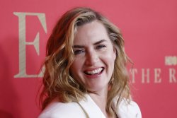 Kate Winslet all smiles at 'The Regime' premiere