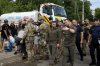 Ukraine's Zelensky visits flooded region; 8 deaths reported