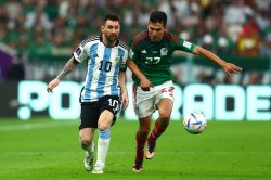 Argentina keeps World Cup hopes alive with win over Mexico