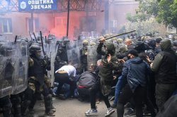 Dozens of NATO peacekeepers, protesters injured in violent clashes in northern Kosovo