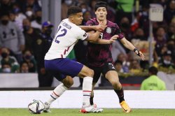 Soccer: U.S. men draw with Mexico, move closer to World Cup berth
