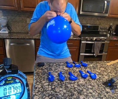 Man inflates 10 balloons in 60 seconds using only his nose - UPI.com