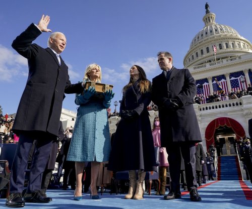 Biden's first year in office marked by lofty goals, some achievements and costly setbacks